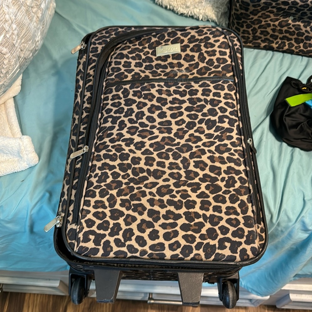 Leopard print small luggage comes in a set but i am selling individually